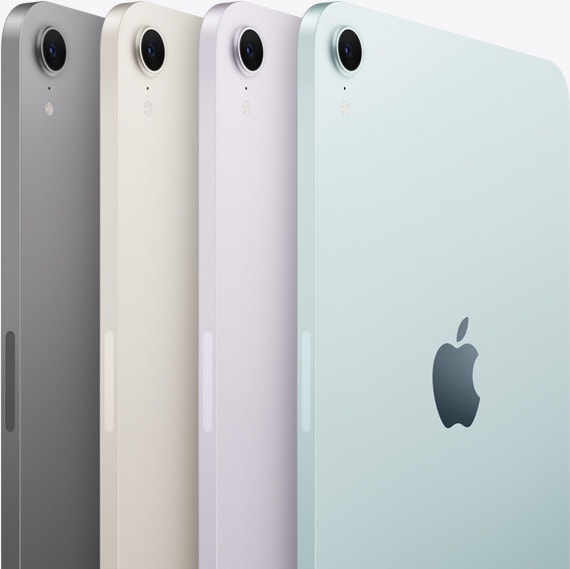 Vue arrière de quatre iPad mini montrant la caméra et les couleurs disponibles : gris cosmique, comète, violet et bleu.